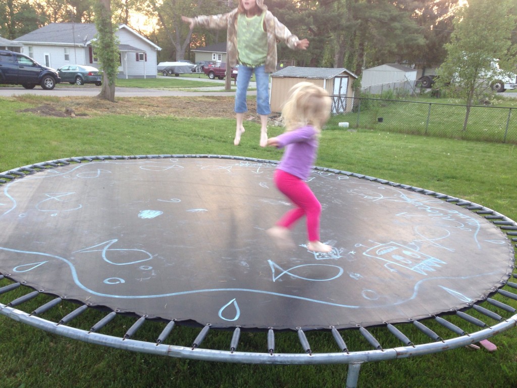 Sidewalk chalk writes well on a trampoline, and stands out against the surface.