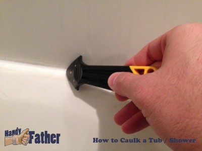 How-to caulk your bathtub - Push caulking tool into corner and pull the bead of caulk cleaning excess often.